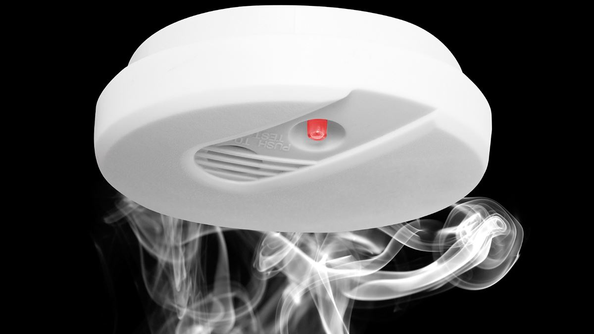 Smoke alarm with smoke around it