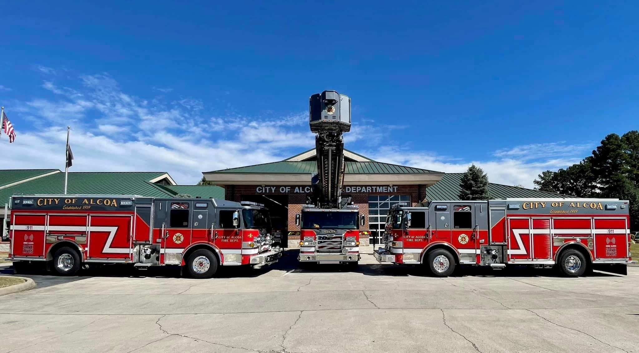 AFD Tower Truck and two engines in front of Alcoa Fire Department