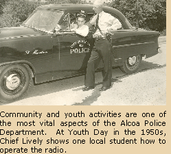 At Youth Day in the 1950s, Chief Lively shows one local student how to operate his police car